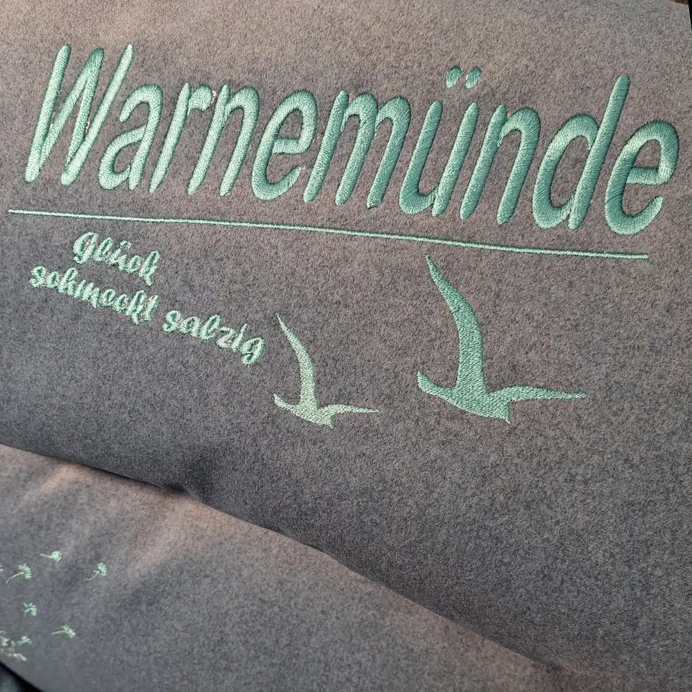 Individuelle Bestickung von Kissen